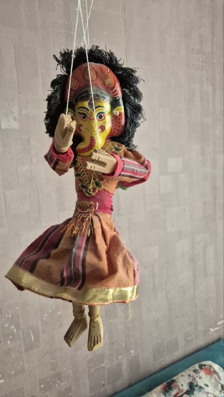Nepalese two faced handmade wooden puppet