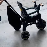 Doona Liki Trike, дождевик, сумка 1