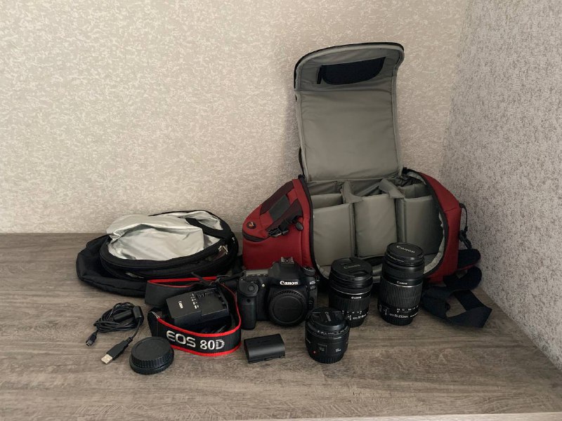 Canon 80D camera with three lenses and accessories