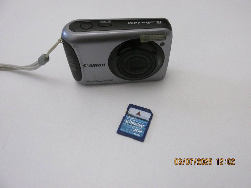 Xbox 360 elite with games and Canon Power Shot 5