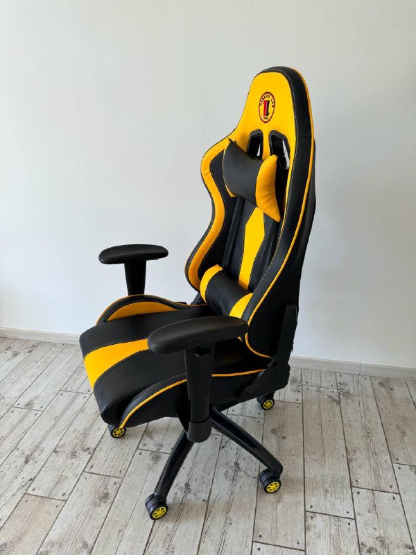 Yellow computer chair with neck and lumbar pillows 3