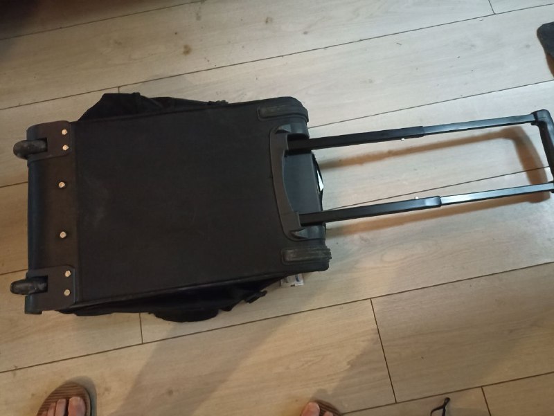 Heavy duty travel bag with wheels and handle