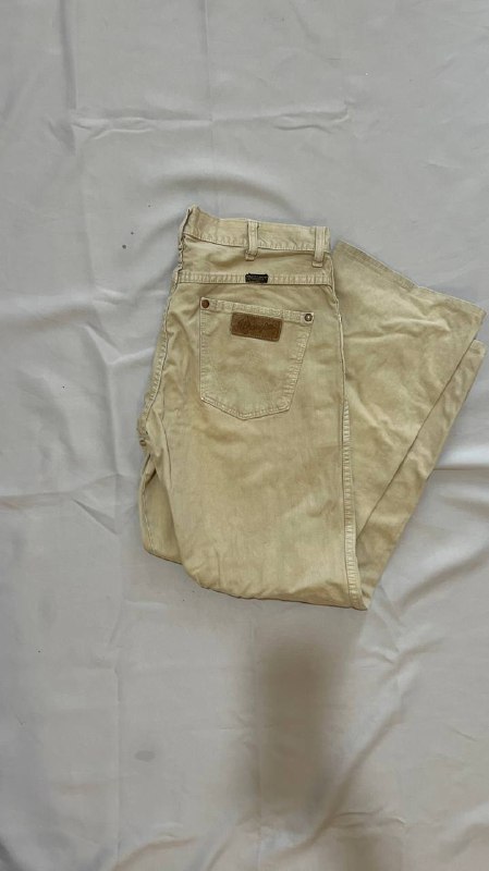 Джинсы Wrangler синие, бежевые