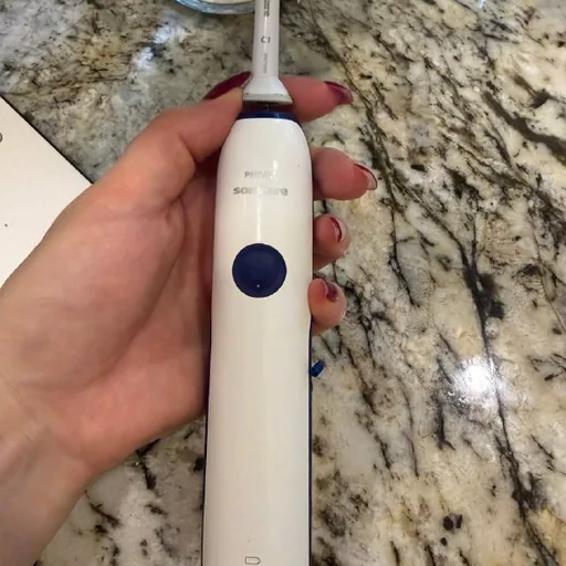 Электрическая зубная щетка Philips