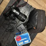 Зеркальные камеры Canon EOS 1100D, объективы 18-55 и 18-200 мм 4