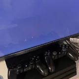 Sony PlayStation 4 Pro с двумя контроллерами 2