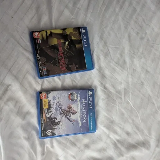 PS4 discs: Horizon Zero Dawn, Shin Megami Tensei Nocturne