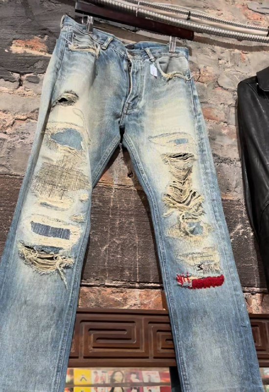 Undercover 68 red yarn jeans with boro stitching
