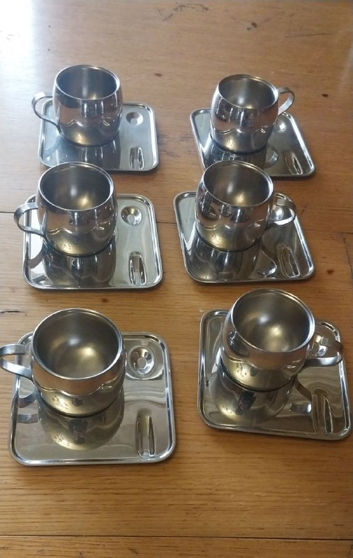 Set of 6 metal cups with saucers