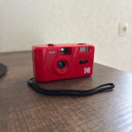 Плёночный фотоаппарат Kodak M35, электрическая зубная щётка Oral-B Braun PRO Timer