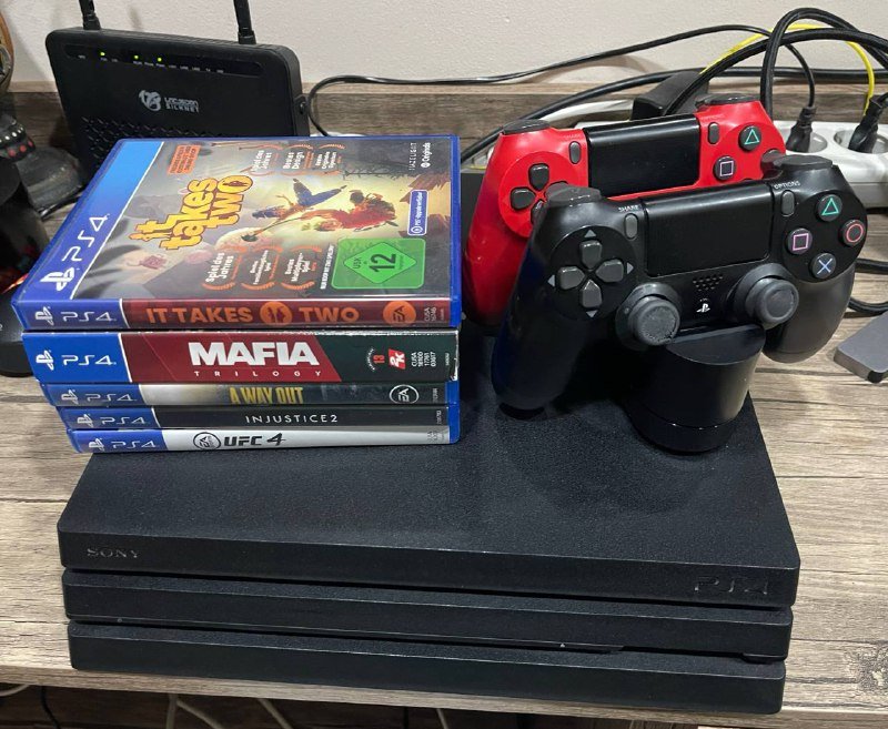 PS4 Pro 1 TB, 2 геймпада, 7 дисков