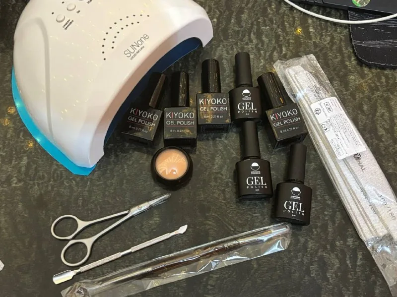 Manicure set with lamp and nail polishes