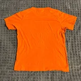 Оранжевая футболка Champion, жилетка, куртка, термобелье 2