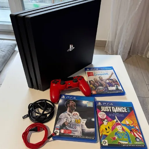 Sony PS4 Pro 1TB с джойстиком и играми