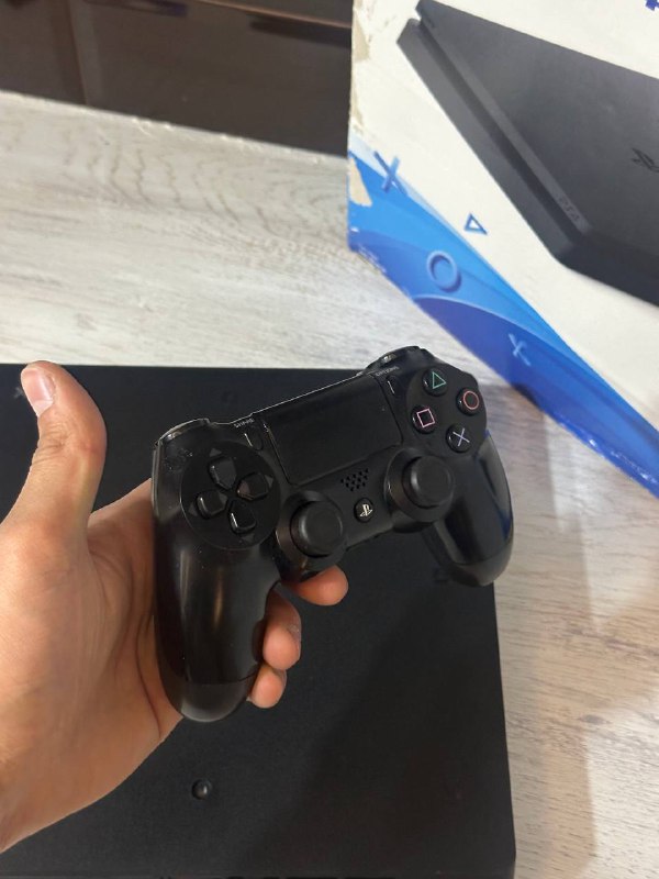 PlayStation 4 with accessories 4