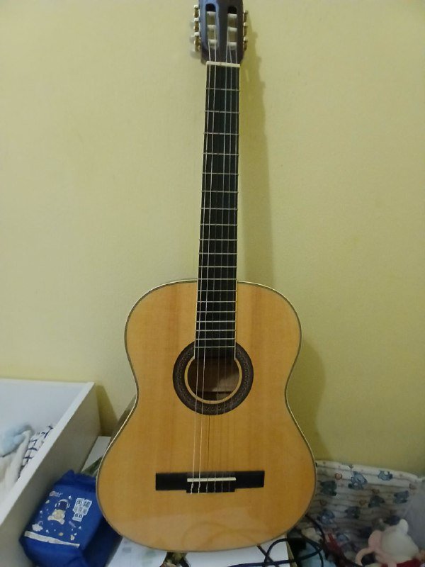 Гитара новая