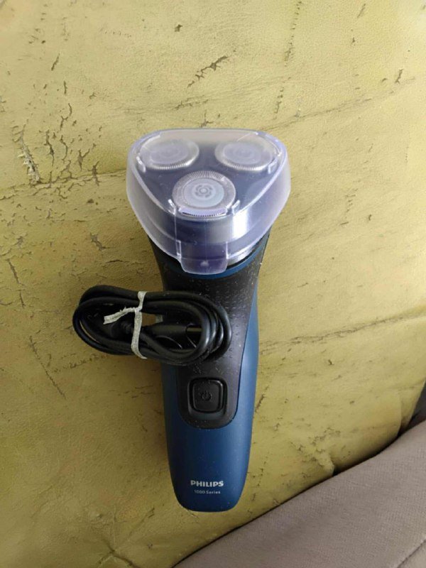 Косметика и электрический триммер для ухода 7