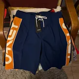 Кроссовки Jordan, карго шорты Oakley, шорты для плавания, футболки Nike, Adidas 10