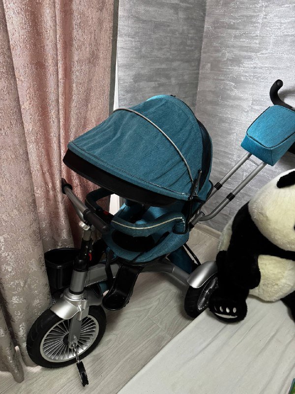 Детский трехколесный велосипед с ручкой