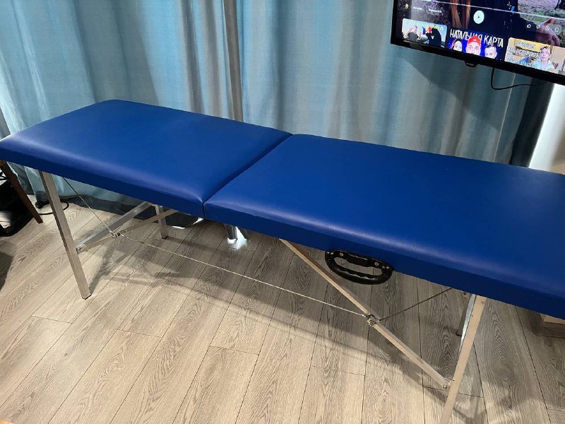 Кушетка и одноразовые простыни