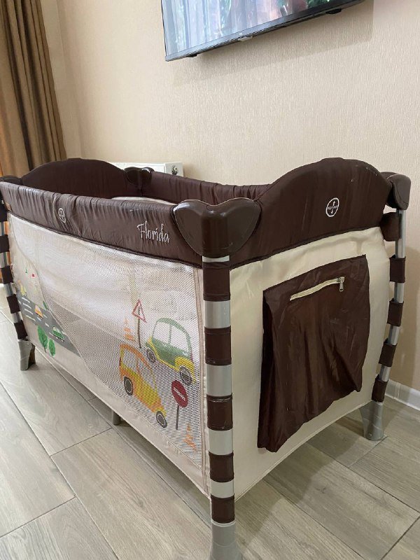 Кровать-манеж с матрасом, пеленальным и сумкой 4