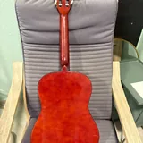 Six-string guitar with case 3