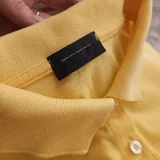 Жёлтое поло без рукавов Sergio Tacchini 2
