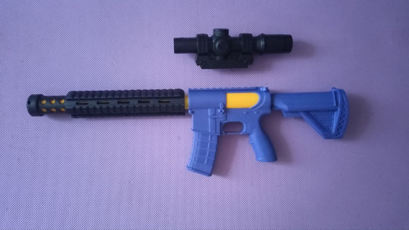 Игрушечный автомат с мягкими шариками 2