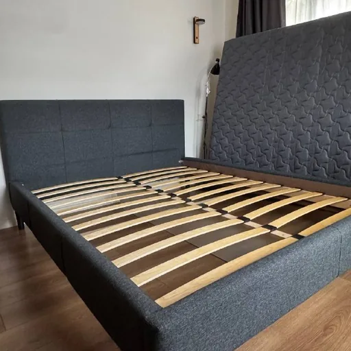Double bed with orthopedic mattress