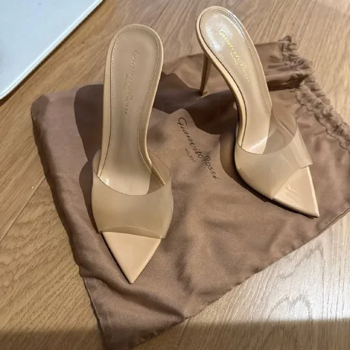 Women’s beige high-heeled shoes