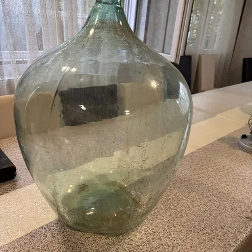 Large glass bottles, 55 and 18 liters