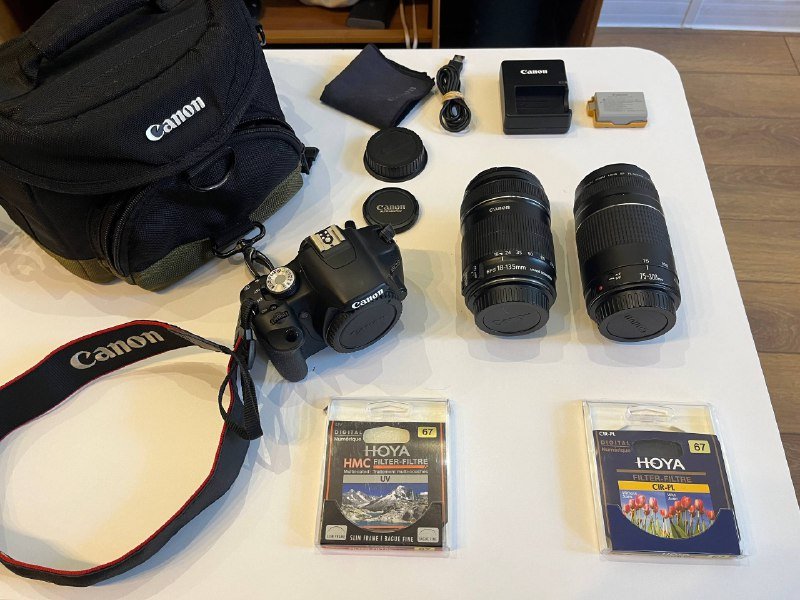 Canon EOS 500D, объектив Canon EF-S 18-135 mm, объектив Canon 75-300 mm, фильтры, зарядное устройство, 2 аккумулятора, ремень, сумка 3