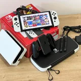 Nintendo Switch OLED, флешка 128gb, чехол-сумка 1