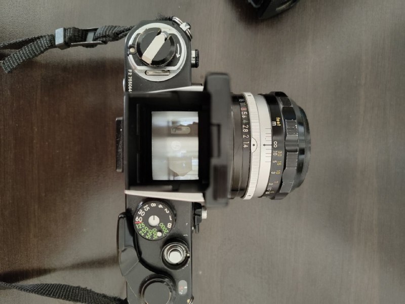 Фотоаппарат Nikon F2 с объективом Nikkor 50mm 1.4 и шахтой 5