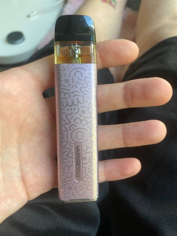 испар Vaporesso с жидкостью