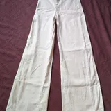 Джинсы MNG EUR32 с прорезанными карманами 1