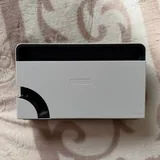 Nintendo Switch OLED с двумя парами контроллеров и чехлами 5