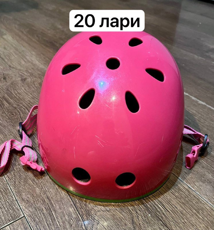 Защитные шлемы розовый и черный