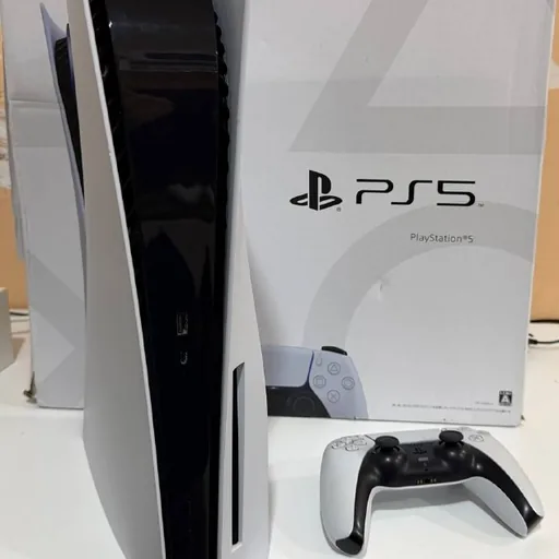 PlayStation 5 with disc drive and games