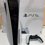 PlayStation 5 with disc drive and games 1