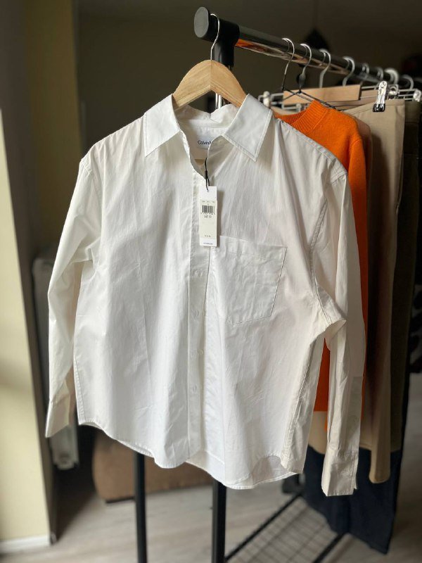 майка Uniqlo, юбки, рубашка Calvin Klein, платье Zara, свитер Zara, ботинки Timberland 4