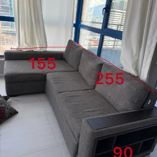 Corner sofa bed with storage space