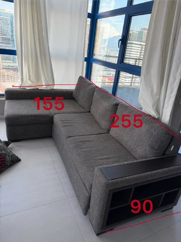 Corner sofa bed with storage space