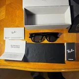 Samsung camera, Calvin Klein watch, Ray-Ban glasses, Kangol hat 4