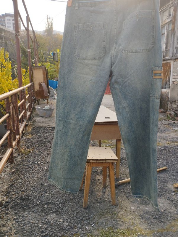 Джинсы зеленоватого оттенка 48 размер