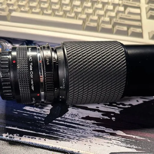 Телебъектив Tokina 80–200mm f/4.5, телеконвертер Vivitar MC 2х22