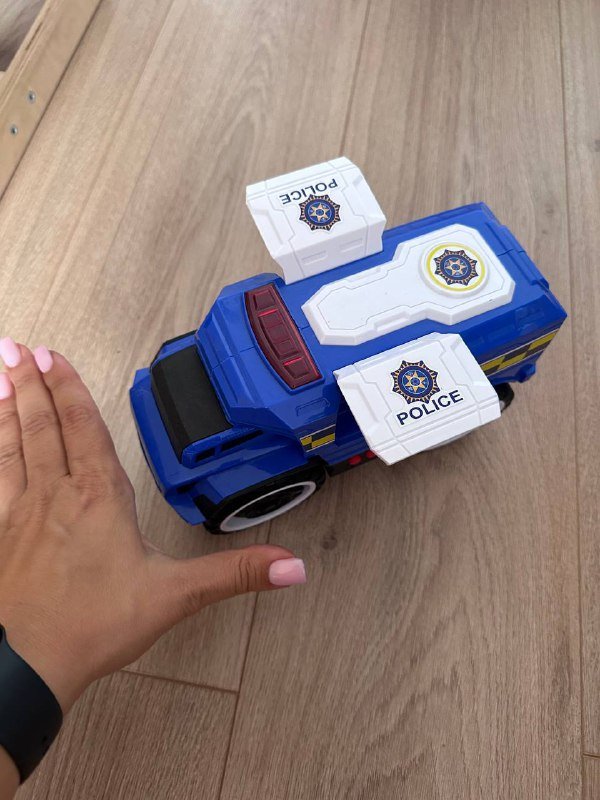 Игрушечная полицейская машина со звуком