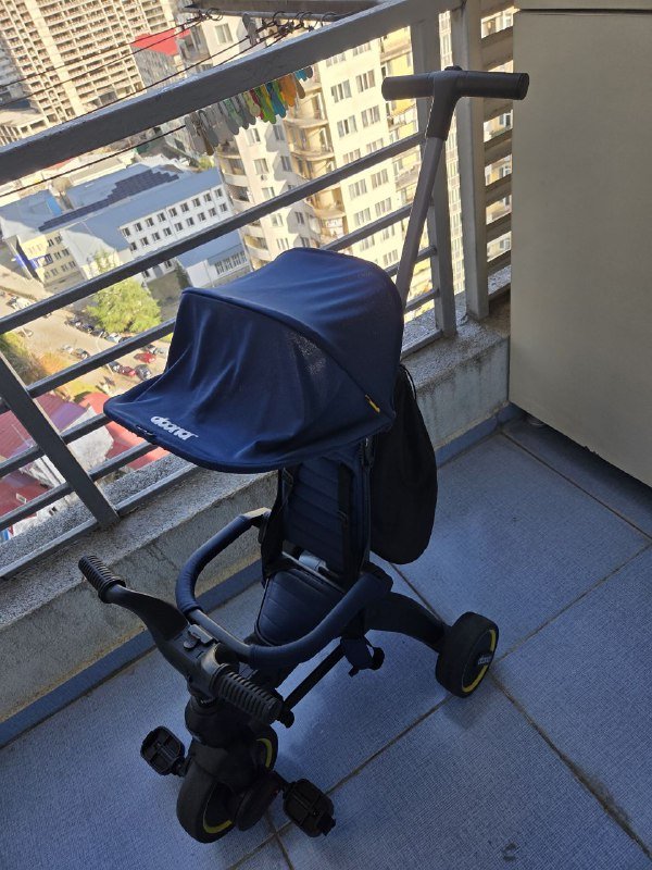 велосипед Doona