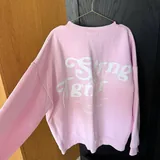 Jacket with fur collar, pink sweatshirt, tanning spray, sports bags, hair ties 2