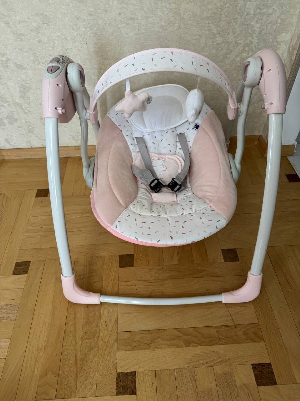 Электрическая качеля для малышей
